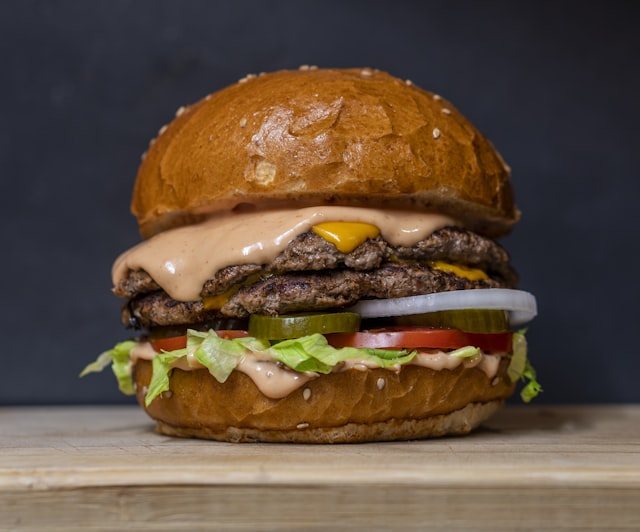 Northside Burger stacked high on a brioche bun with fries