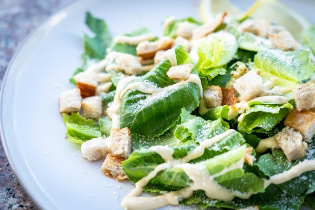 Crisp caesar salad with shaved parmesan and sourdough croutons